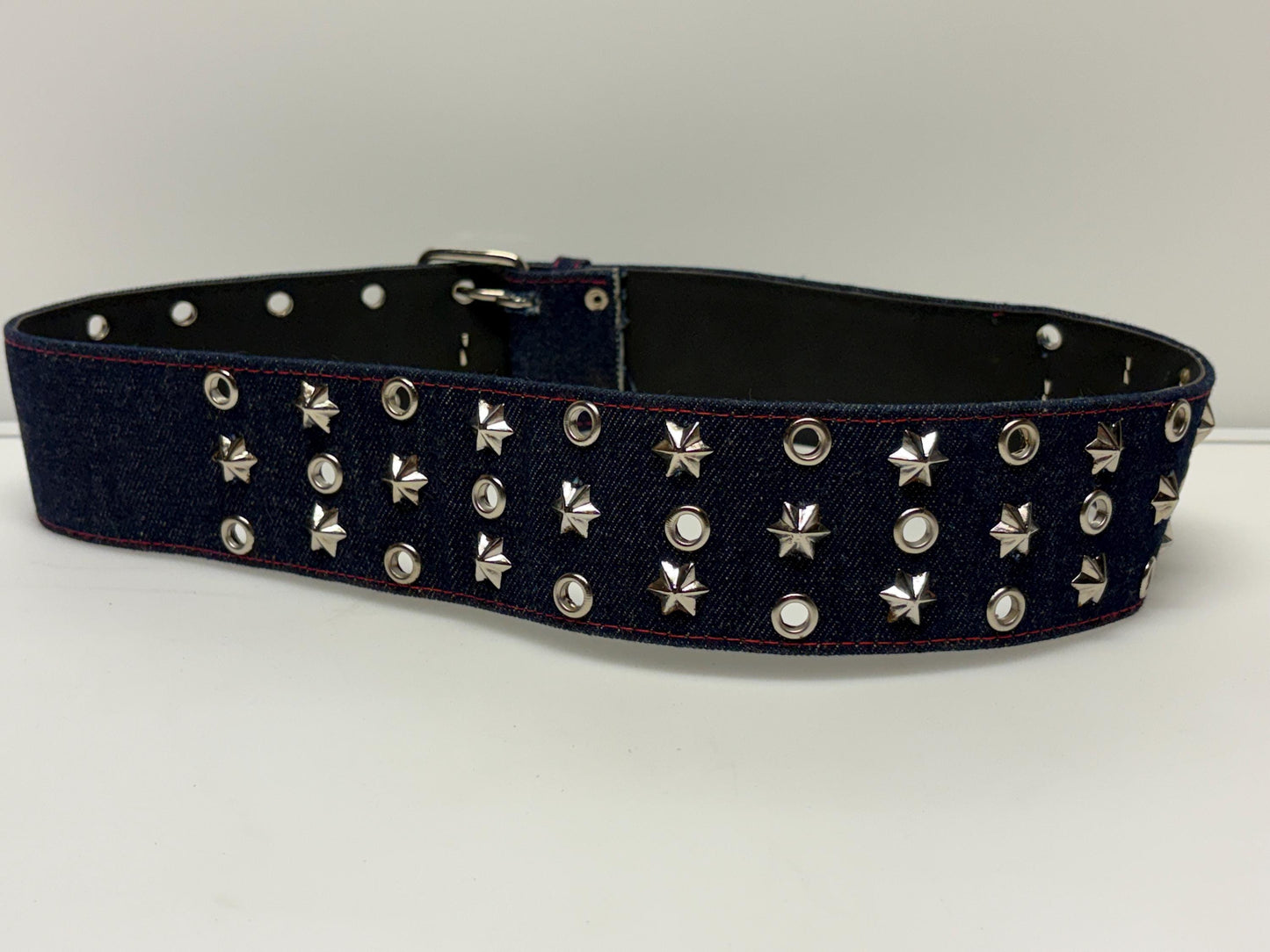 Y2k vintage tall blue denim belt with metal buckle and 3 rows of cool conical star studs and loops. Statement feature piece. 2000s NOS