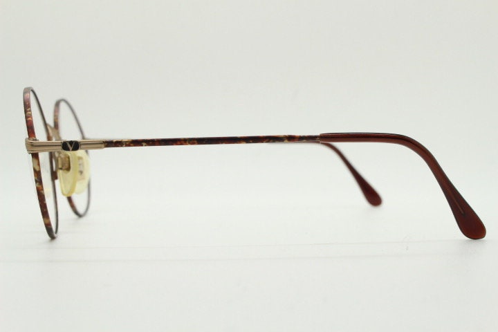Valentino 90s vintage round panto eye glasses made in Italy. Brushed bronze optical frames with metallic matt tortoise. Prescription RX
