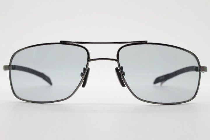 90s vintage modified rectangular aviator sunglasses. Gunmetal chrome frame aviators with light tone smoky grey lenses. Unused NOS