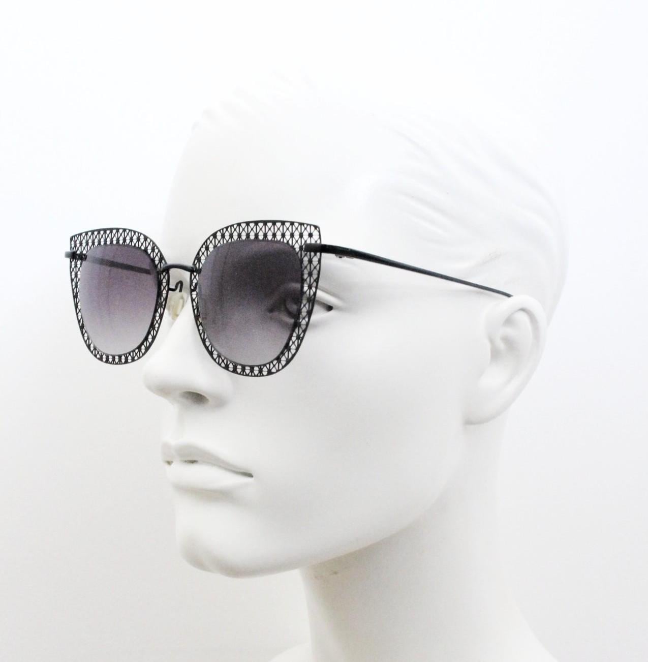 Metal cut out vintage cat eye sunglasses.  Women's imaginative black lacey pattern flat cateye frame with smoky graduating lenses