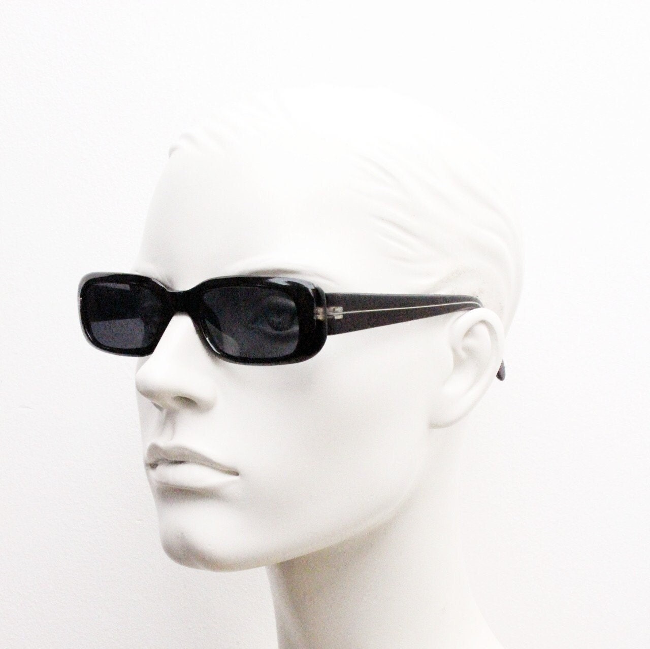 90s authentic vintage abstract rectangular sunglasses. Thickened black frame with red crackle print. NOS