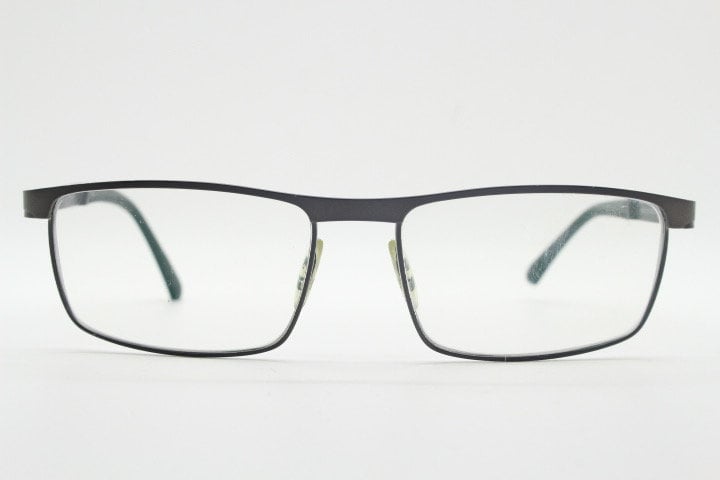 Porsche design rectangular eye glasses model 8251 made in Japan. Minimal gunmetal grey wire optical frame. Prescription RX spectacles