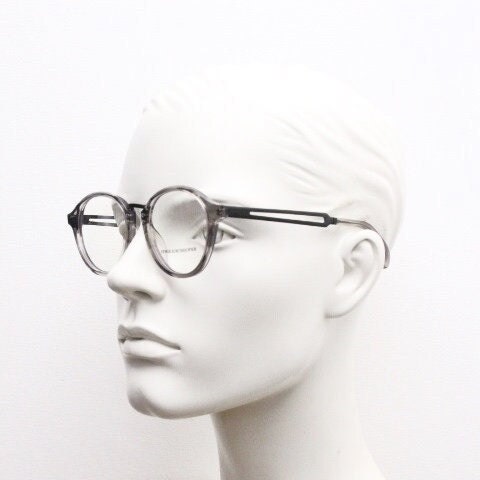 Serge Kirchhofer vintage round titanium eye glasses made in Italy. Transparent grey acetate optical frames. Prescription eyeglasses. RX