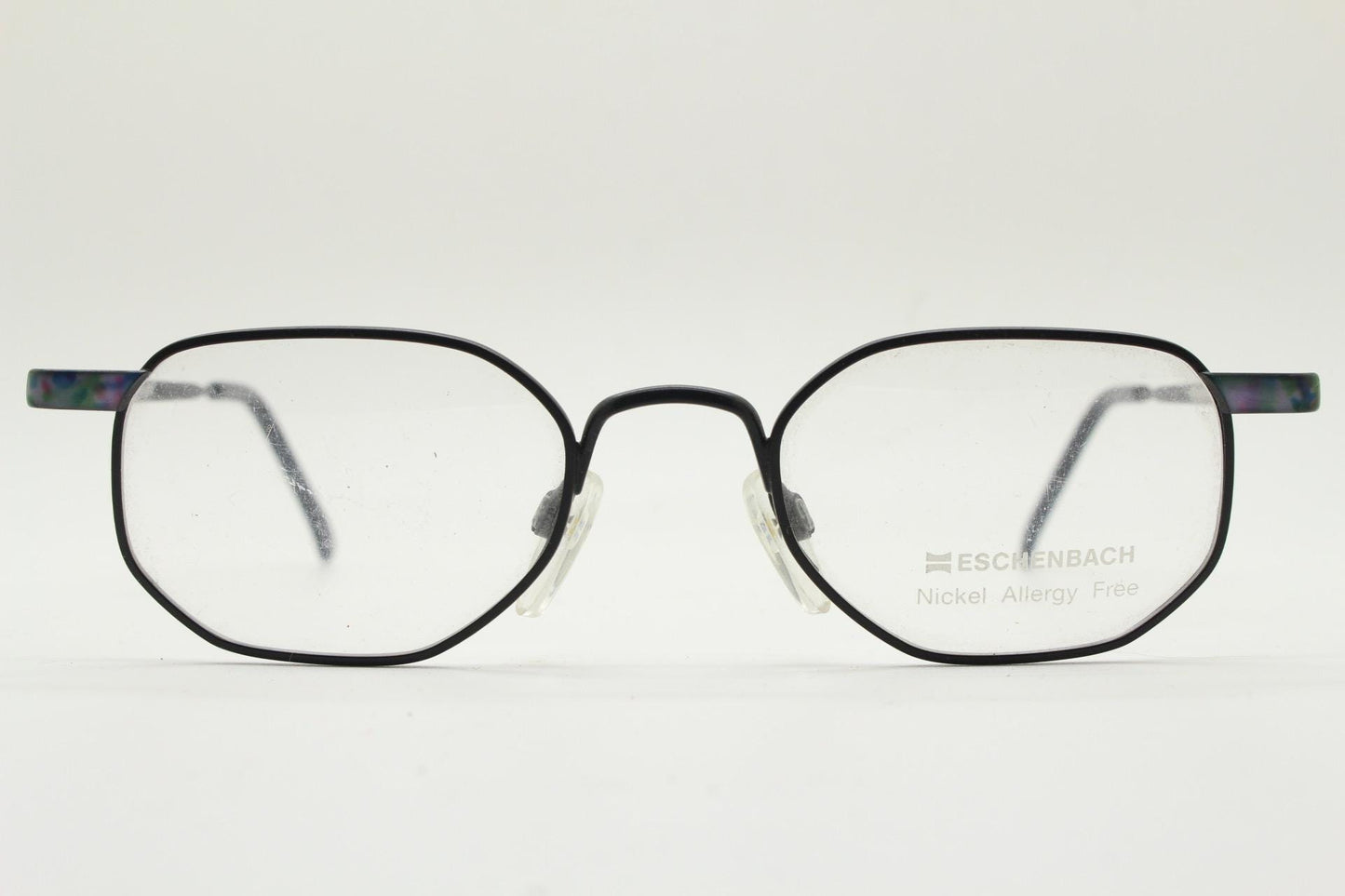 Eschenbach 90s vintage angular octagon eye glasses. Sharp matt black optical frame with blue marbled arms. Prescription RX spectacles. NOS
