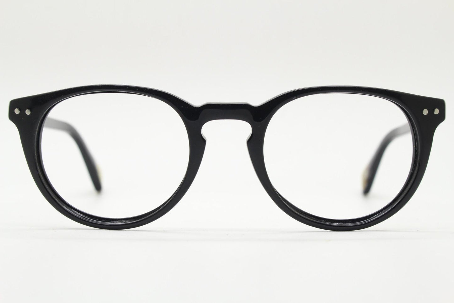 90s vintage oval eye glasses by Alles Brille of Germany. Classical black gloss acetate optical frames with keyhole bridge. RX Spectacles