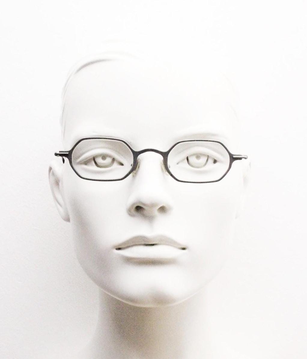 DKNY 90s vintage hexagon eye glasses made in Italy. Small matt grey optical frames. Prescription RX. Donna Karan. Victorian style steampunk