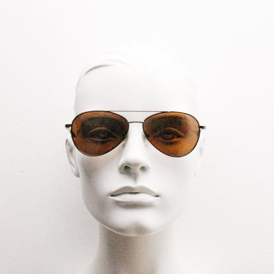 90s vintage medium sized aviator sunglasses. Brown chrome metal frame with plain brown lenses. Teardrop aviators. Pilot. Unused NOS.
