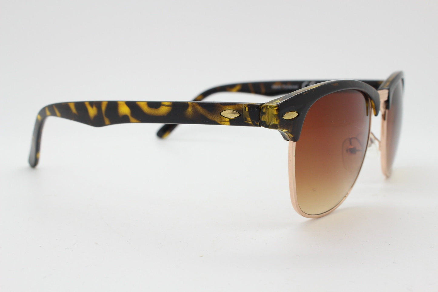 90s vintage browline sunglasses. All time classic design in tortoise gloss with gold half rim. 50s, 60s. Unused NOS