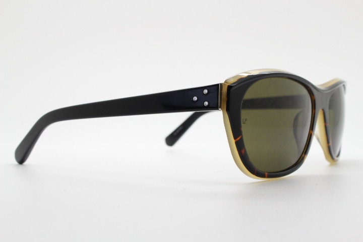 Linda Farrow Luxe sunglasses made in Japan. Blended black and tortoise layered acetate. Gallery Projects Vintage. NOS