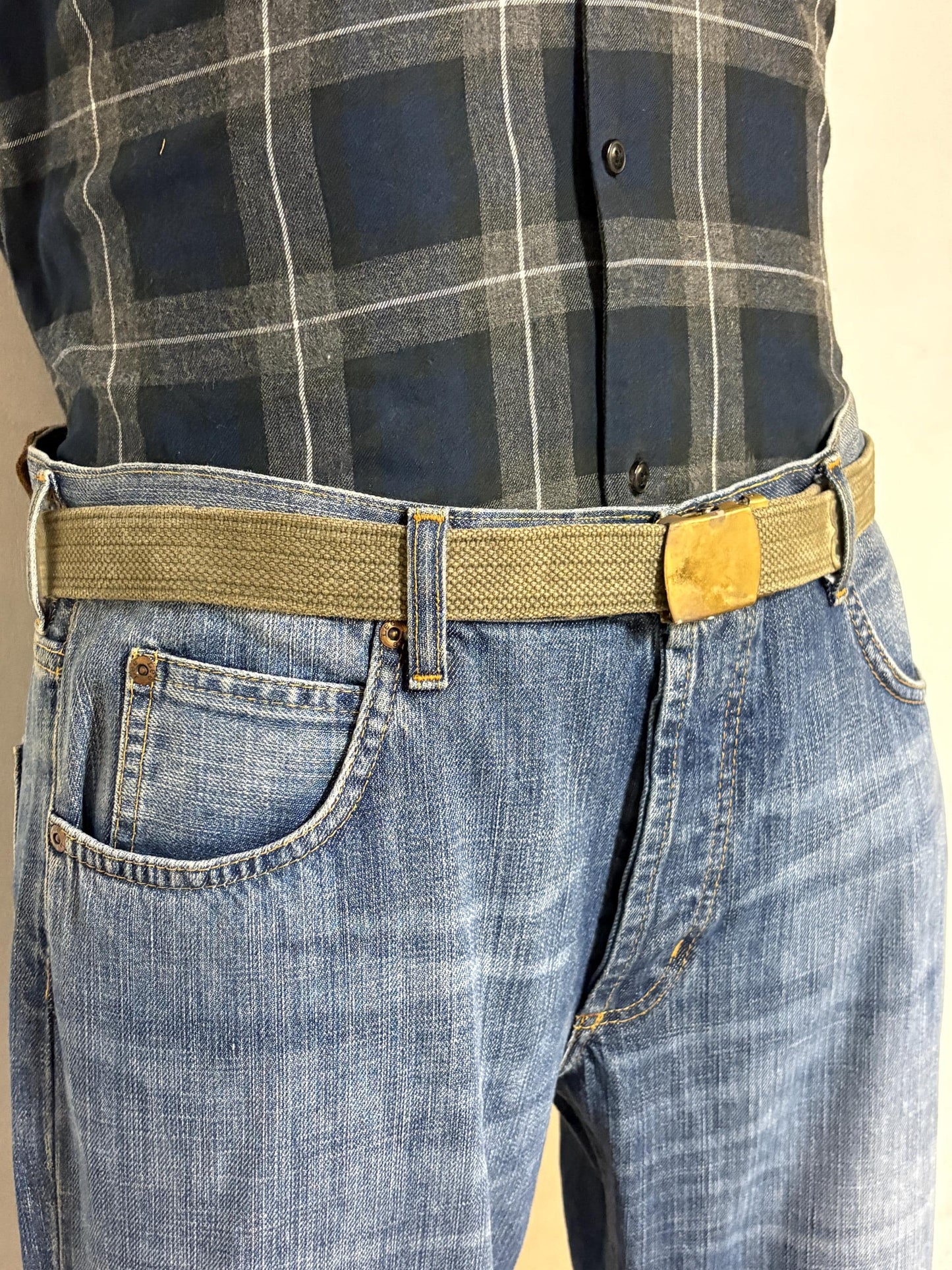 2 x bundle 80s vintage canvas army belts. One black plus one khaki green no holes format. Slide lock gold buckle. Webbing. Fully adjustable