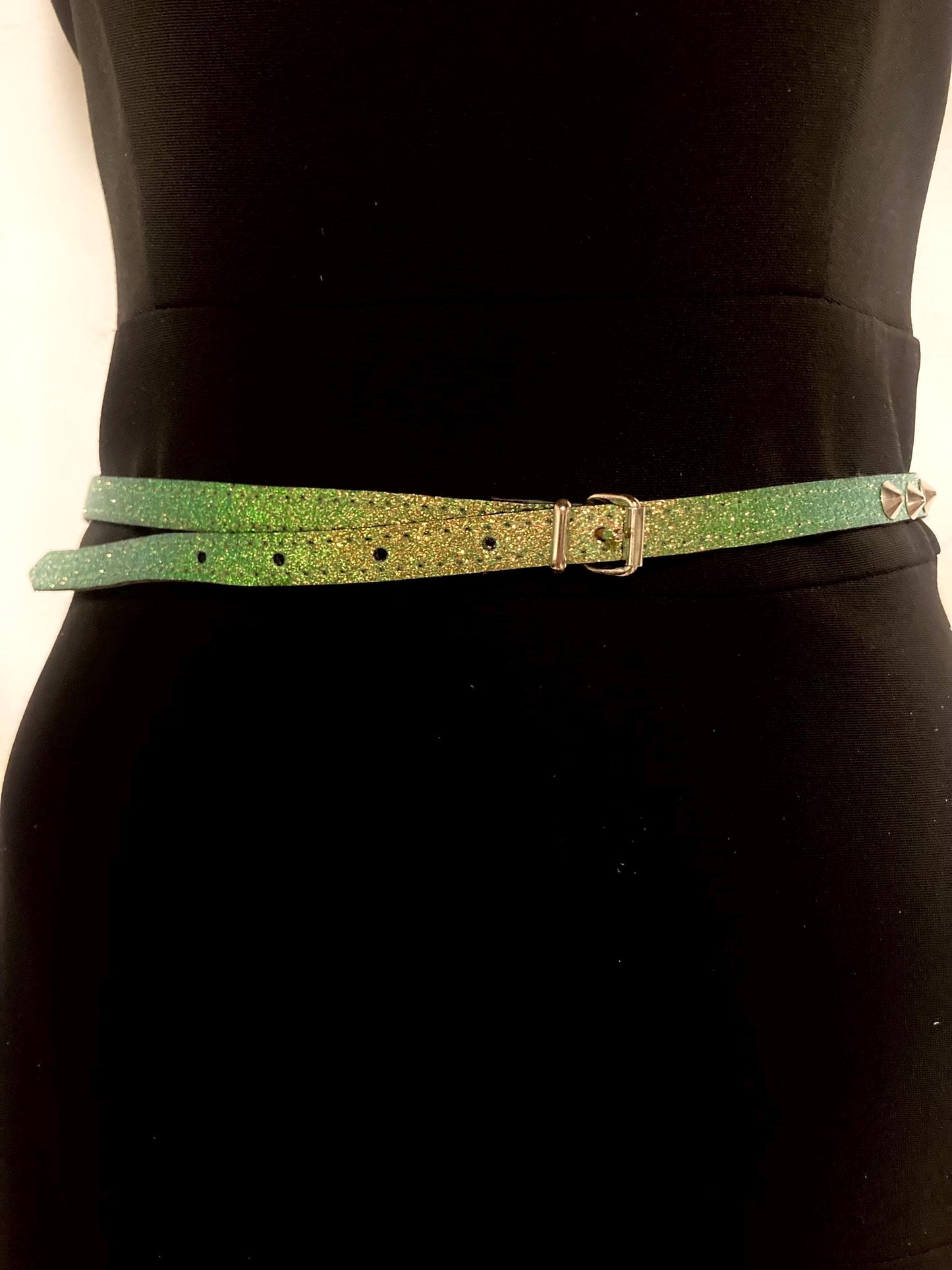 Y2k vintage womens slim green dust glitter belt with single row of silver metal cone studs. 2000s NOS. Size L. Goth. Cosplay