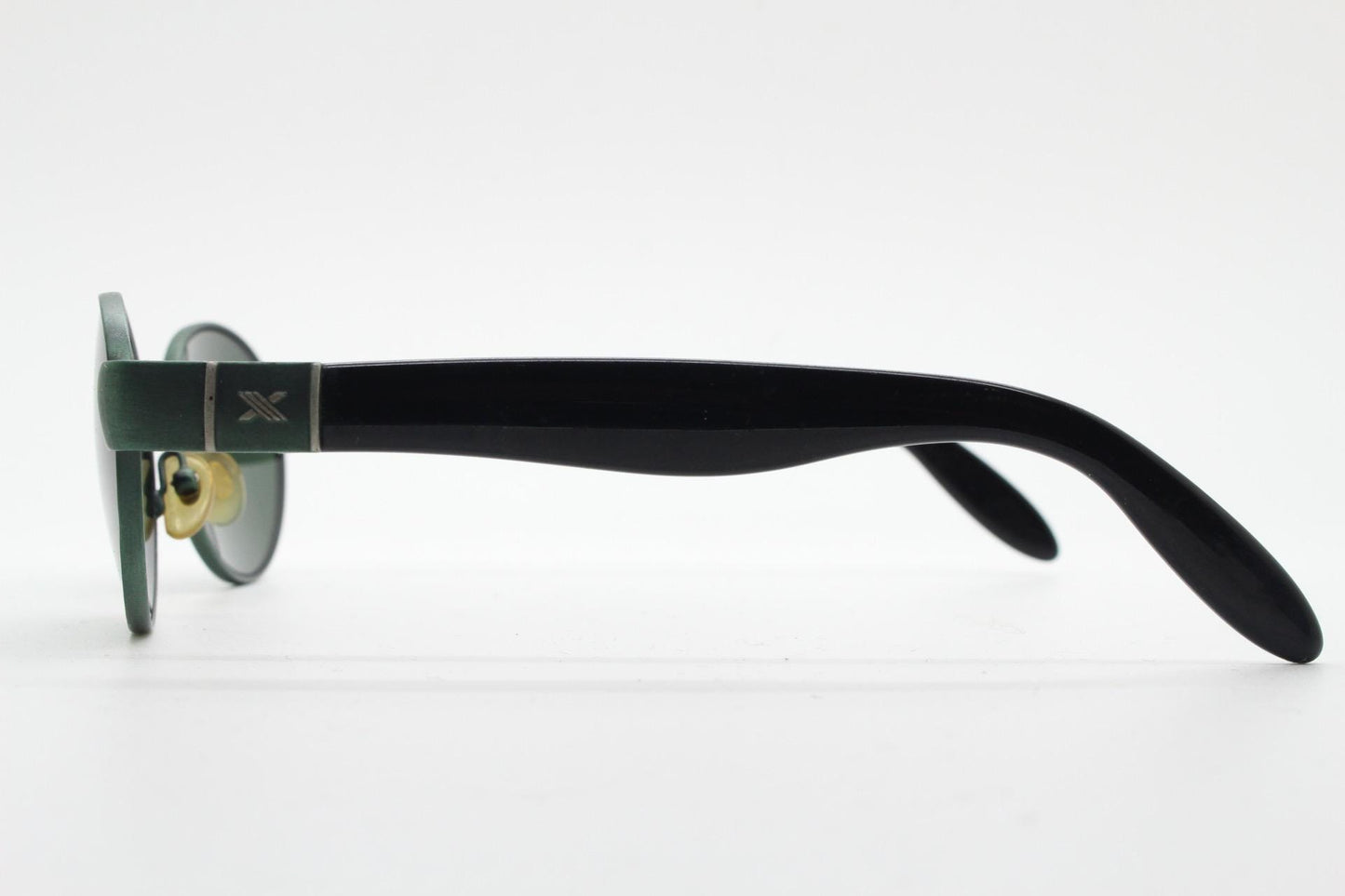 Safilo for Oxydo 90s vintage oval sunglasses made in Italy. Green matt finish solid metal frame with black arms and green lenses. Unused NOS