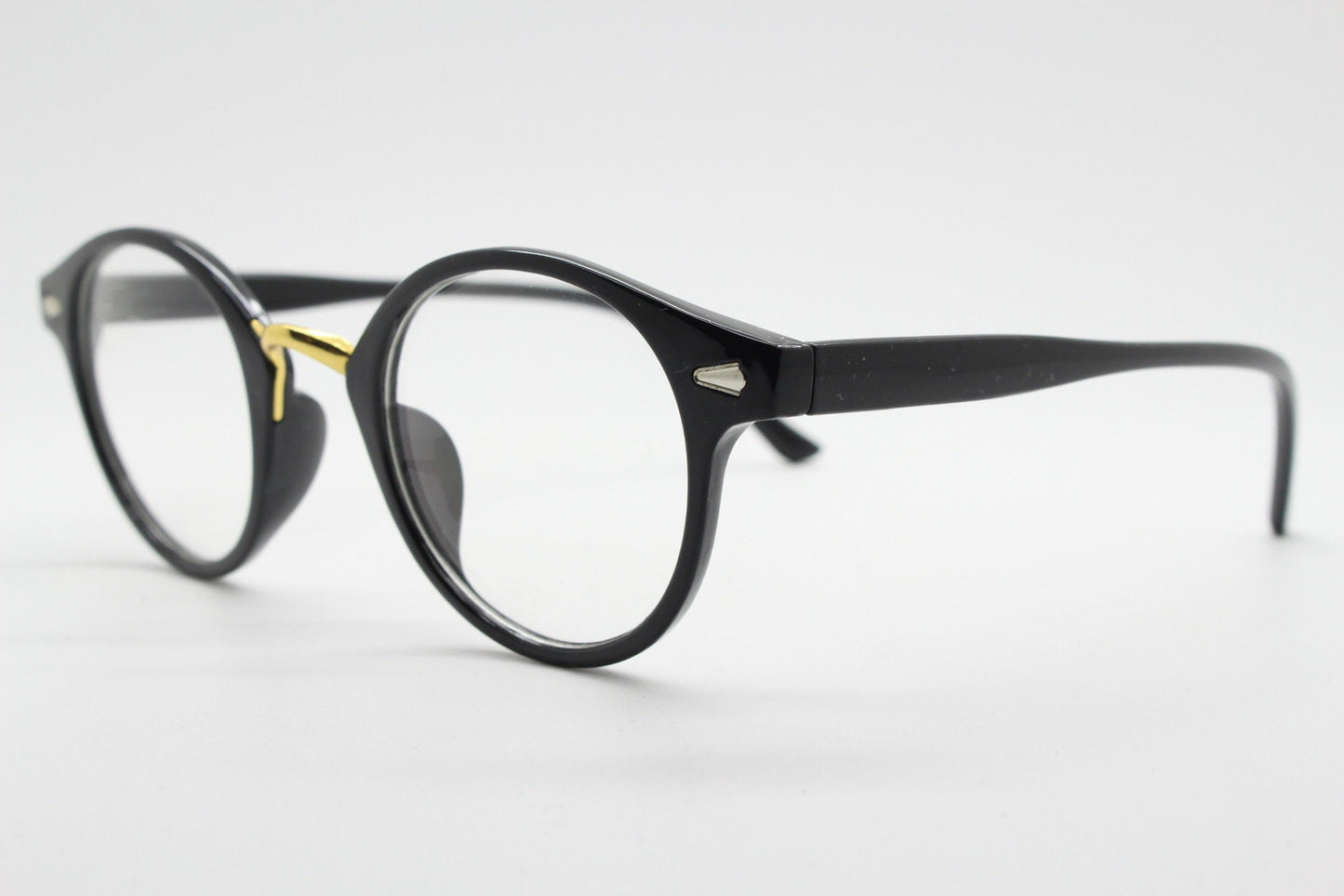 90s vintage slender frame glasses. Black with gold bridge optical frames. 40s, 50s style prescription eyeglasses. Clear lens eyeglasses. RX