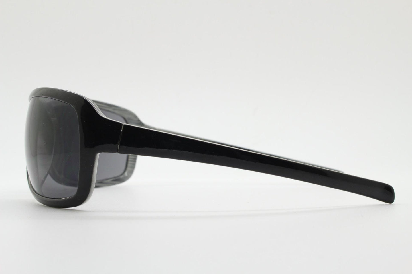 Y2k vintage wrap around large square sunglasses. Curved black shield frame with tasteful striped interior. 1960s bug eye design. 2000's NOS