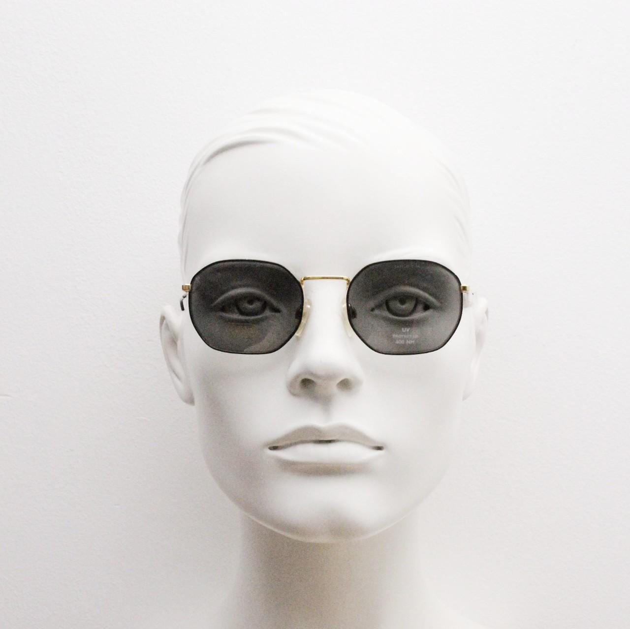 Safilo 90s vintage angled rectangular sunglasses made in Italy. Flexible black wire  metal frame with gold trim and green lenses. BNWT NOS