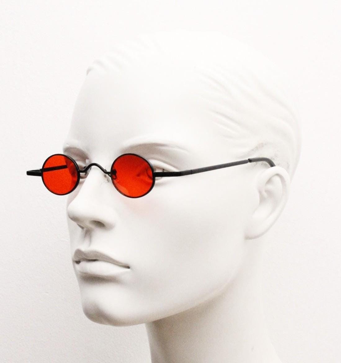 90s vintage small oval sunglasses. Imposing minimal black gloss metal victorian antique style frame with bright red lenses. Steampunk. NOS