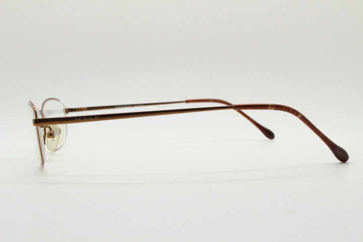 MS&F 90s vintage rectangular eye glasses. Flexible metallic brown chrome flat metal  optical frame. Prescription RX. NOS