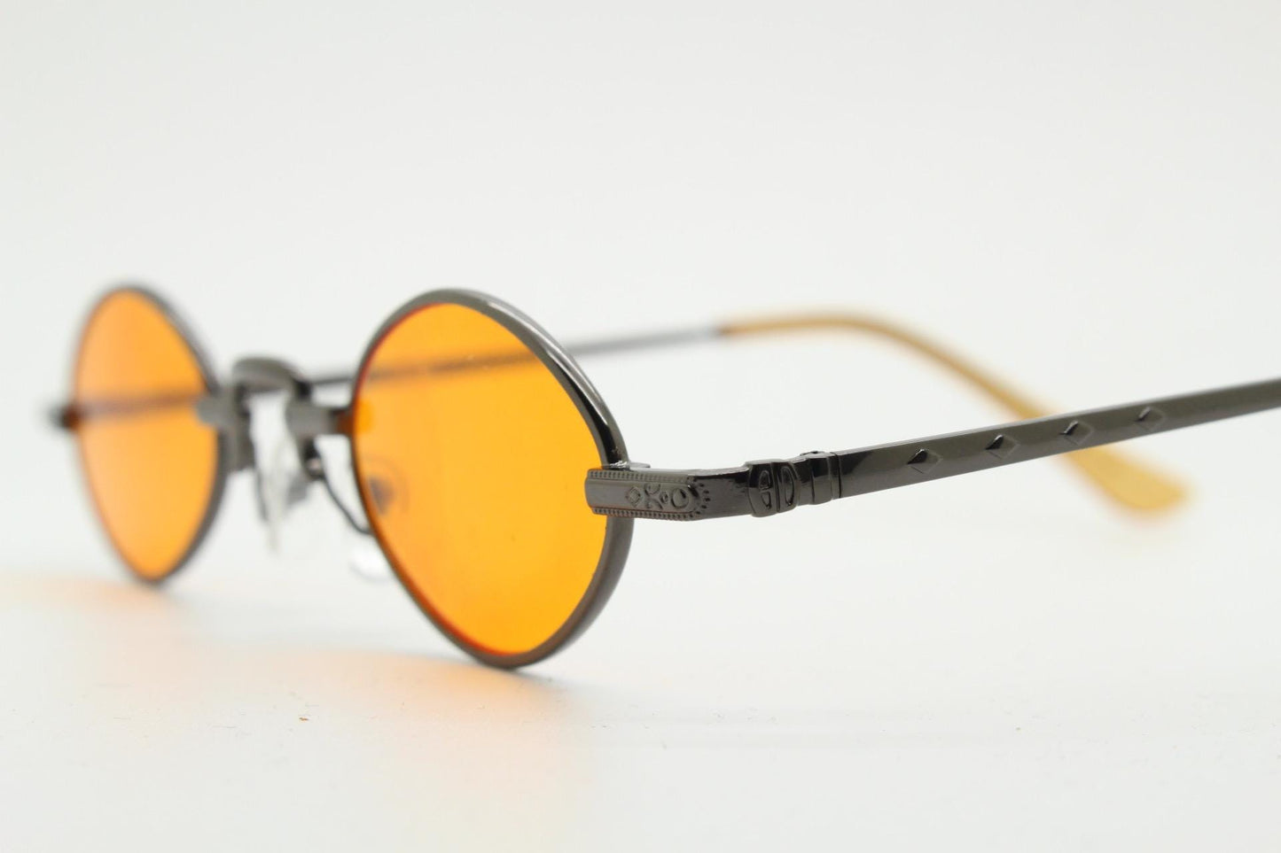 90s vintage small oval sunglasses. Imposing minimal rose gold metal victorian style frame with blazing orange lenses. Steampunk. BNWT