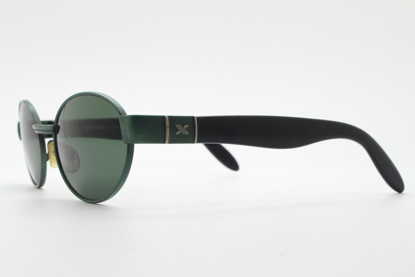 Safilo for Oxydo 90s vintage oval sunglasses made in Italy. Green matt finish solid metal frame with black arms and green lenses. Unused NOS