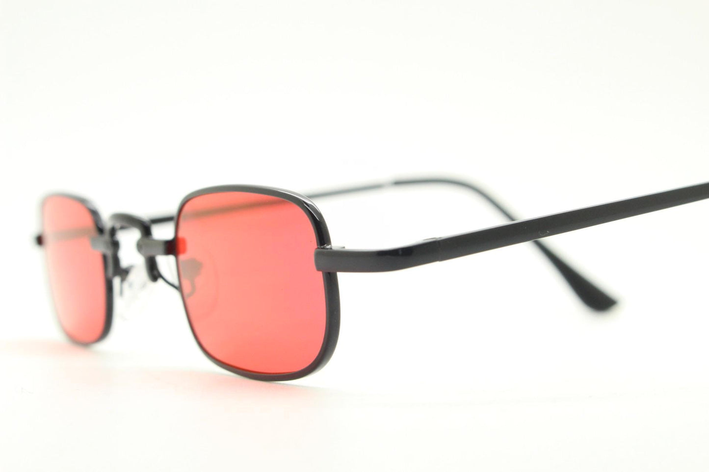 90s vintage small rectangular sunglasses. Imposing minimal black metal victorian style frame with deep red lenses. Unused BNWT
