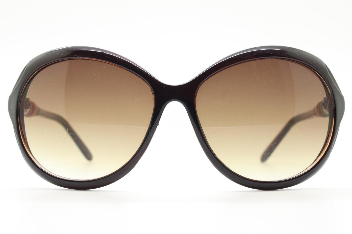 Y2K vintage big round sunglasses. Women's classical 60s design in brown gloss with graduating lenses and subtle arm detail. 2000s. 00s NOS