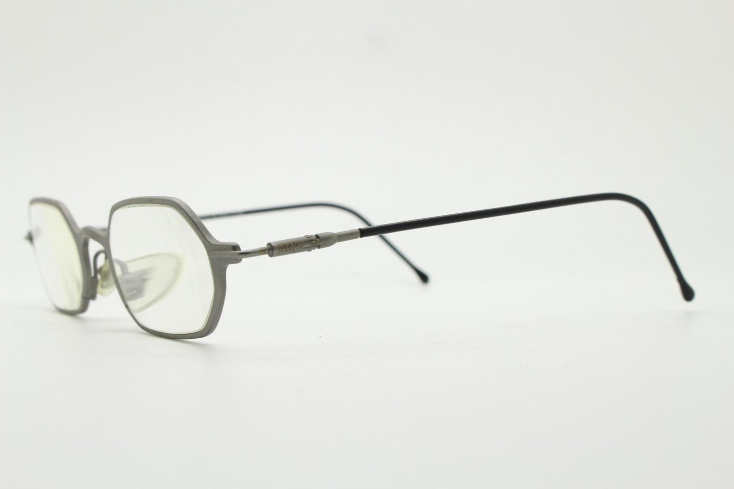 DKNY 90s vintage hexagon eye glasses made in Italy. Small matt grey optical frames. Prescription RX. Donna Karan. Victorian style steampunk