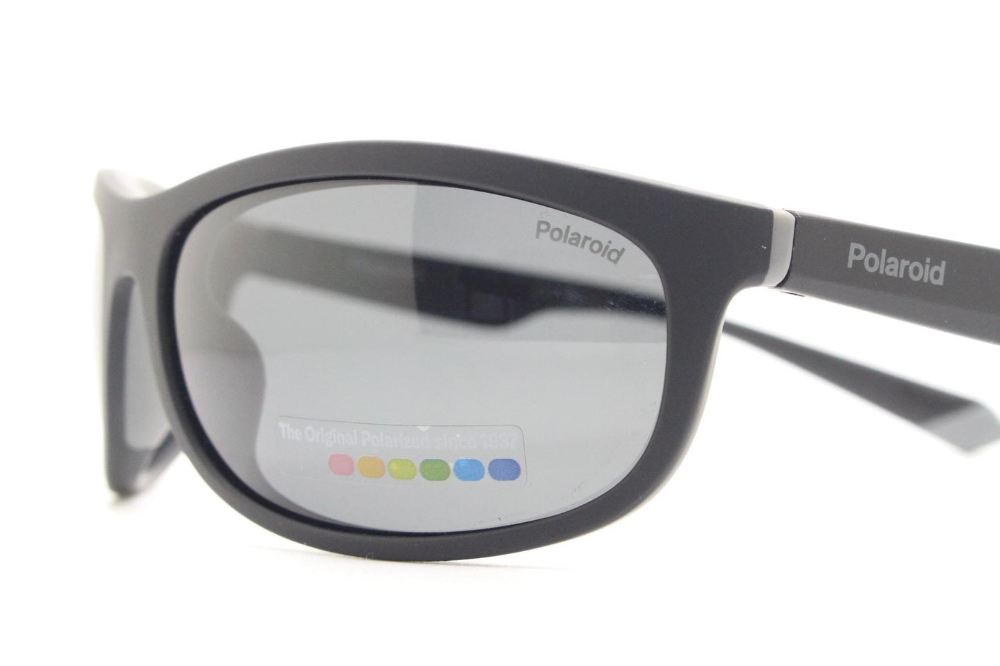 Polaroid vintage sports shield sunglasses. Black rubber finish curved wrap around frame with polarising lenses. 2000s. Y2K. Bug eye. NOS