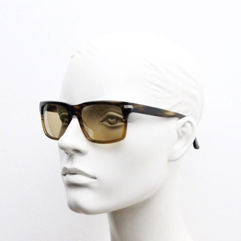 Oliver Peoples vintage rectangular sunglasses model Maceo. Handsome transparent mottled honey brown acetate frame with mid tone lenses