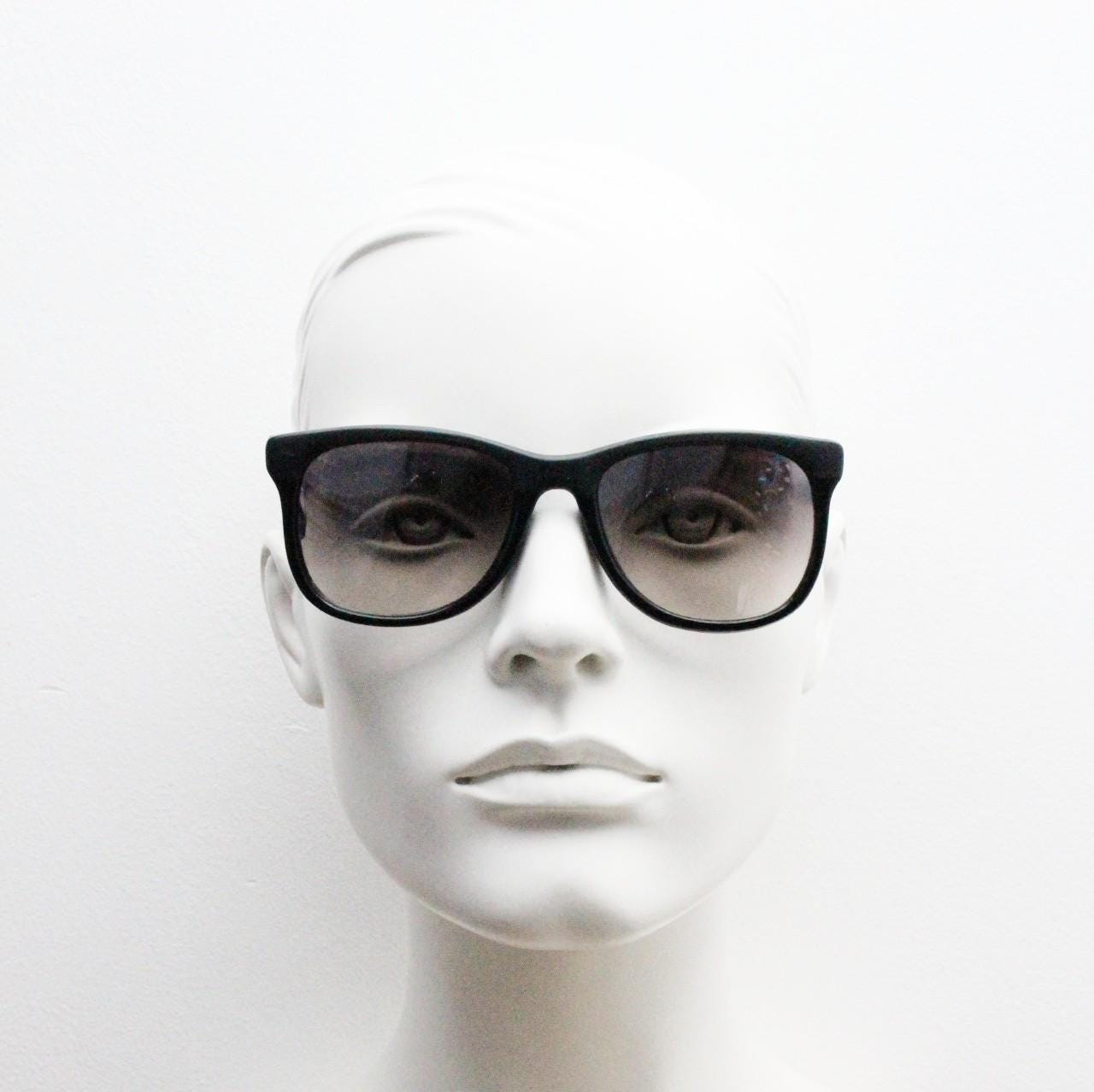 Vintage 80s thick frame black square sunglasses. All time classic design in matt and gloss combo with slight mirror glaze lenses. NOS