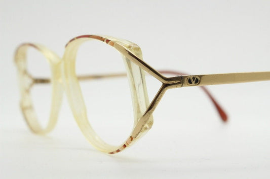 Valentino 90s vintage eye glasses made in Italy. Crystal and abstract pattern optical frames with golden forked arms. Prescription RX