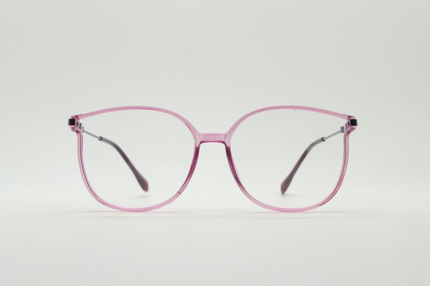Round cat eye glasses. Transparent pink cateye optical frame with purple metal arms and eyecatching glitter sides. Vintage Prescription RX
