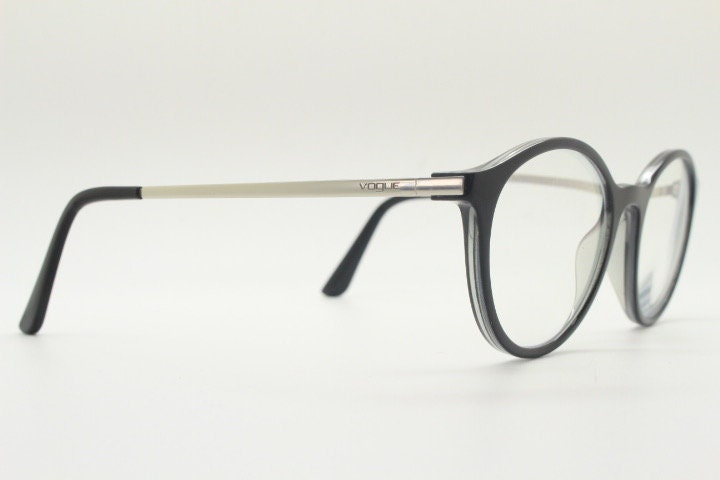 Vogue womens oval eye glasses model 5223. Black acetate optical frames with metal arms. Prescription eyeglasses. RX spectacles