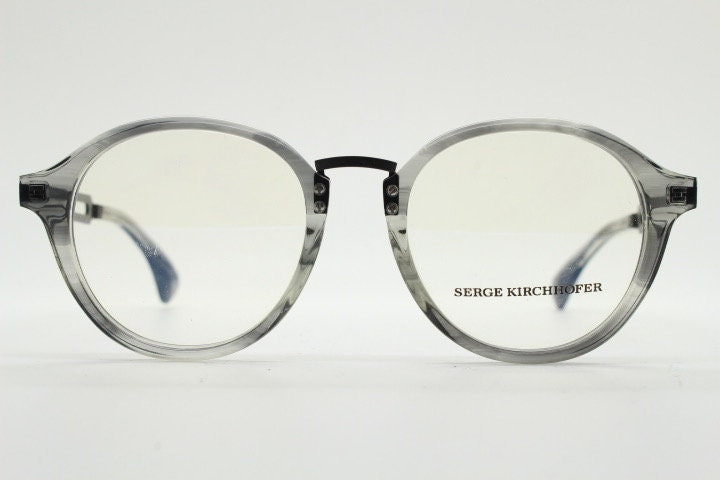Serge Kirchhofer vintage round titanium eye glasses made in Italy. Transparent grey acetate optical frames. Prescription eyeglasses. RX