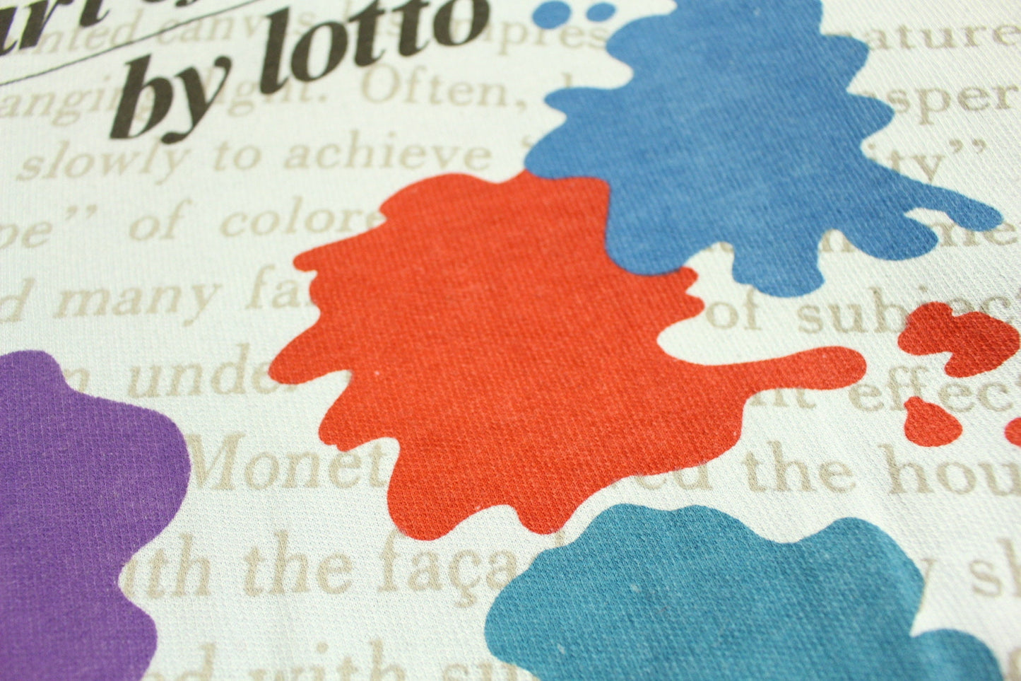 Vintage 80s blue sweatshirt by Lotto with 'art of colours' paint splash graphic. Made in Italy.