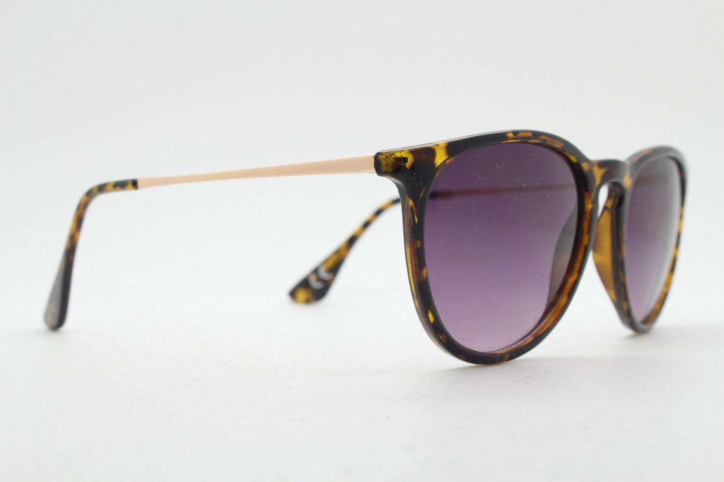 90s vintage sunglasses. Tortoise gloss frame with graduating black lenses and contrasting gold arms. Unused NOS