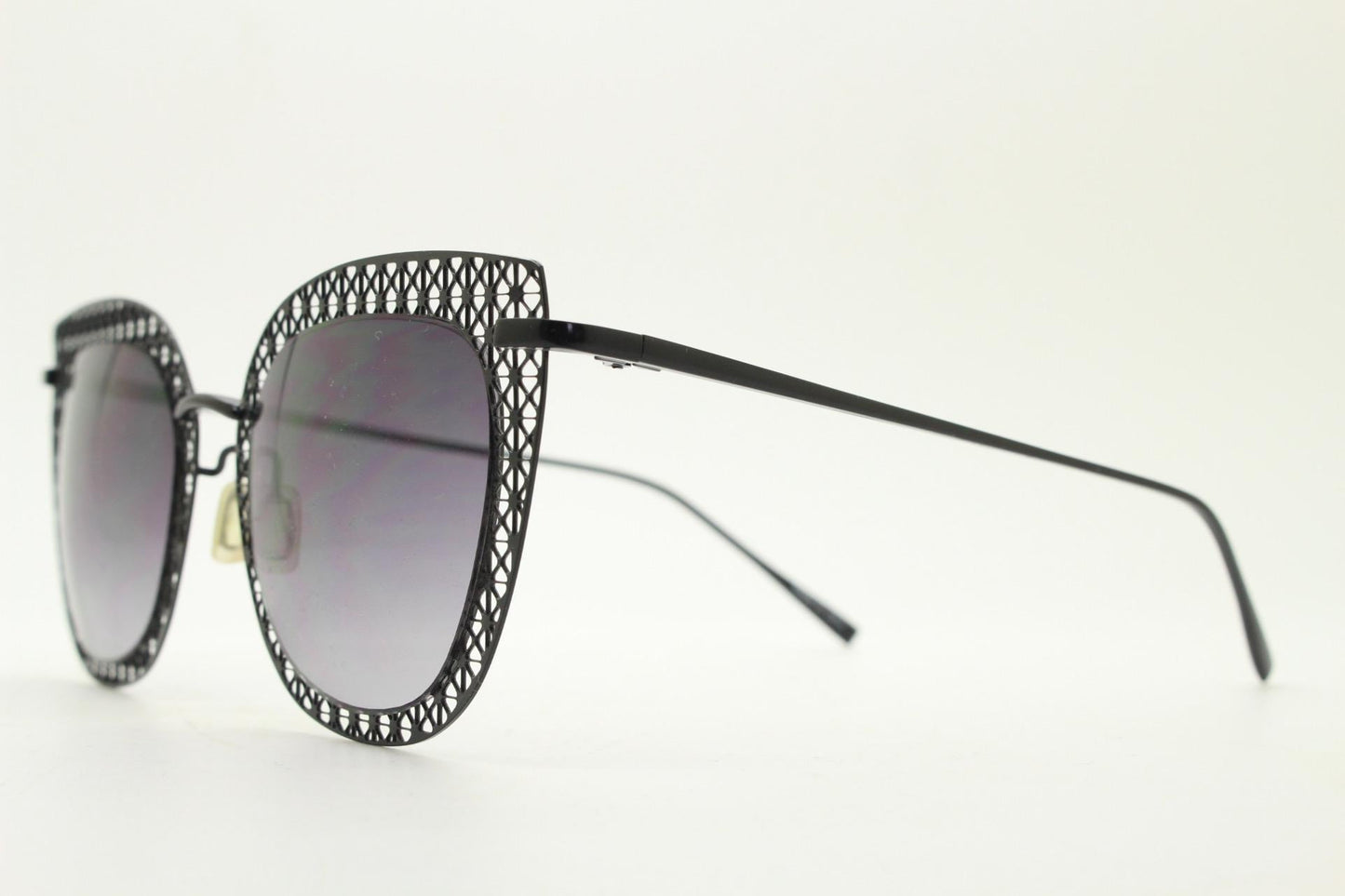 Metal cut out vintage cat eye sunglasses.  Women's imaginative black lacey pattern flat cateye frame with smoky graduating lenses