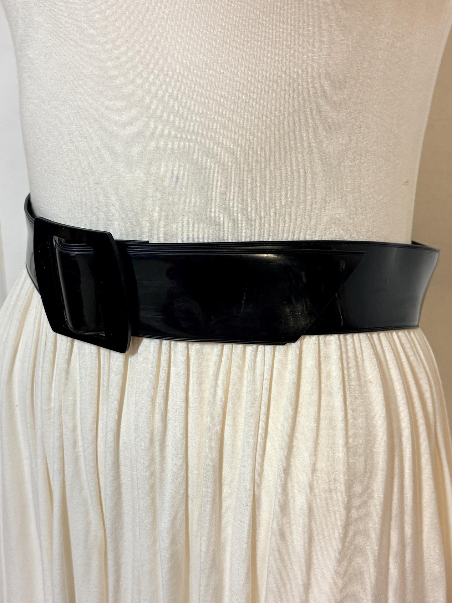 80s vintage womens shiny fetish 2" dress belt. All black seamless vinyl with well matched flat buckle. 50s kinky pin up bad girl