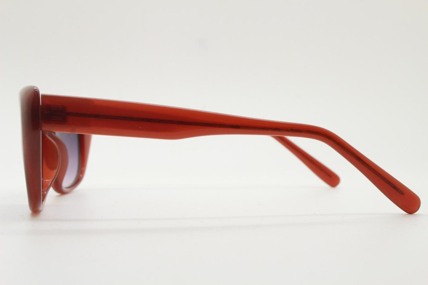 Vintage 90s rectangular cat eye sunglasses. Womens transparent brown acetate cateye in sensible proportions with graduating lenses. NOS