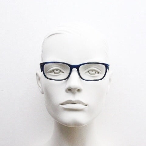 Calvin Klein rectangular low profile eye glasses. Dark navy blue gloss acetate optical frames. Prescription eyeglasses. RX