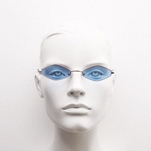 90s vintage small diamond sunglasses. Minimal gold psychedelic mod style frame with sky blue lenses. Unused New Old Stock