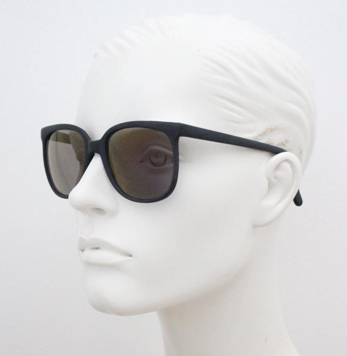 80s vintage flexible square sunglasses. Plain matt black frame with slight gold mirror glaze lens tone. Unused NOS. Rave