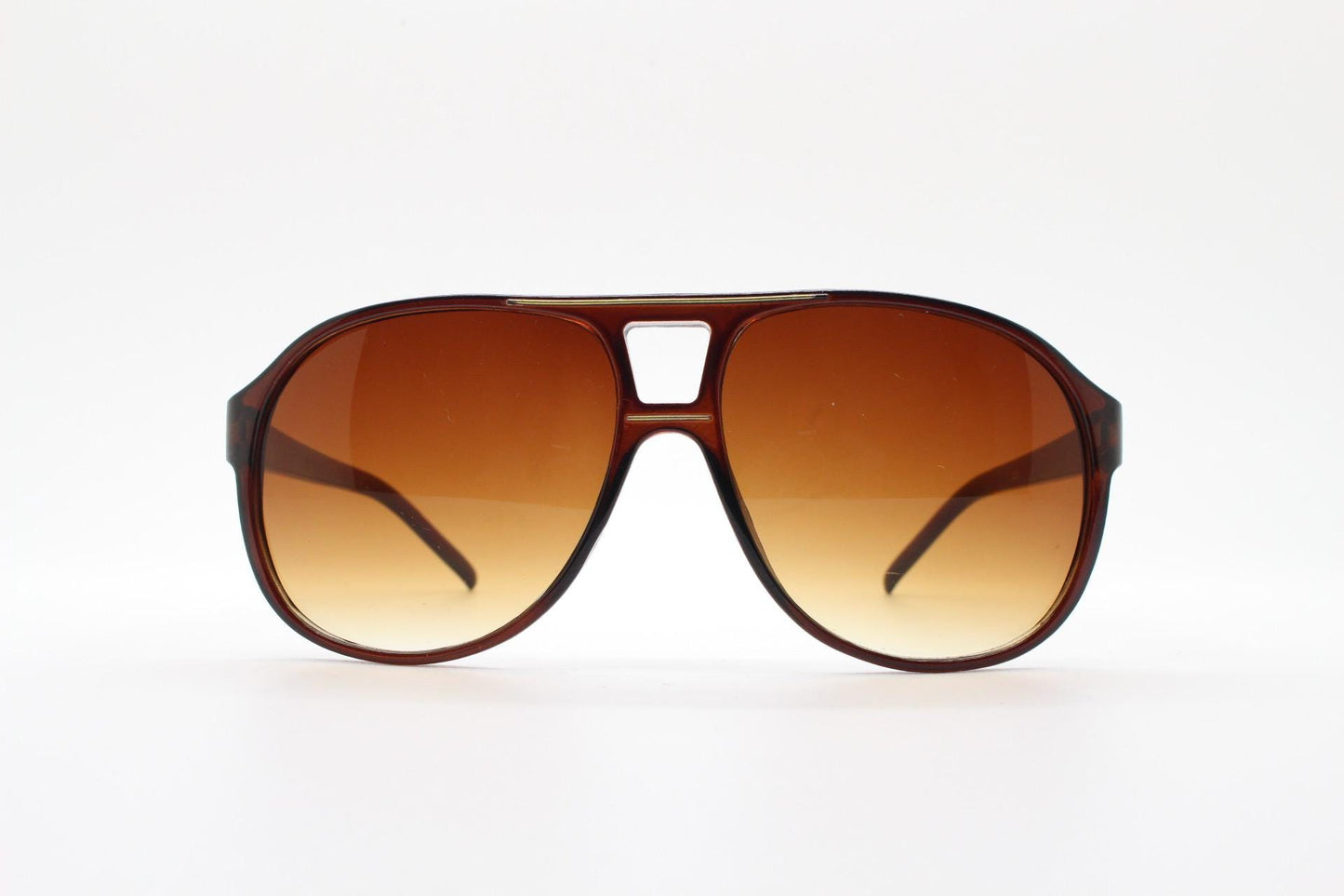 Y2K vintage aviator sunglasses. 2000's transparent brown frame with graduating lenses and gold detail. 70s design. 00's NOS aviators