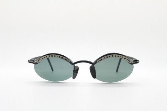 Inkognito 90s vintage small oval sunglasses. Matt finish half frame with spell out logo brow and polarising lenses. NOS
