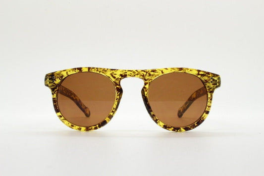90s vintage round glasses. 30s, 40s design with vibrant honey tortoise frame with Havana brown lenses and keyhole bridge. NOS