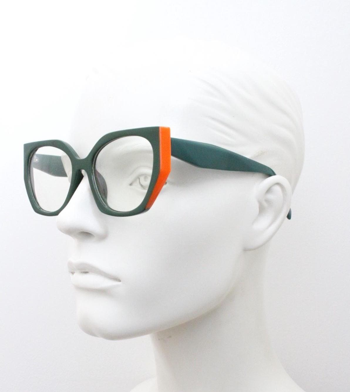 Sharp angled flat top  cat eye glasses. Refined green cateye optical frame with bright orange side sections. Prescription RX Spectacles
