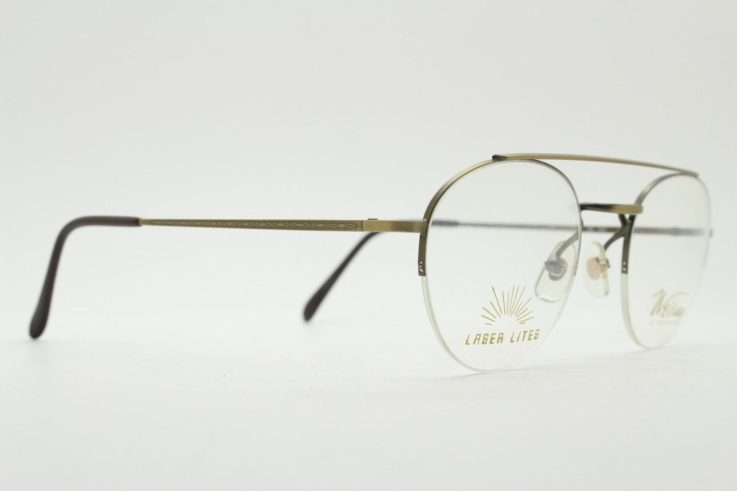 90s vintage round eye glasses made in Japan by Welling. Brushed bronze finish optical half frame. Prescription RX spectacles. NOS