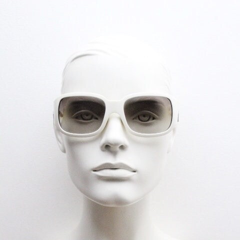 Versace Y2k vintage wrap around bug eye sunglasses. Curving white acetate shield frame with huge spell out diamante logo. 2000s. Rhinestone