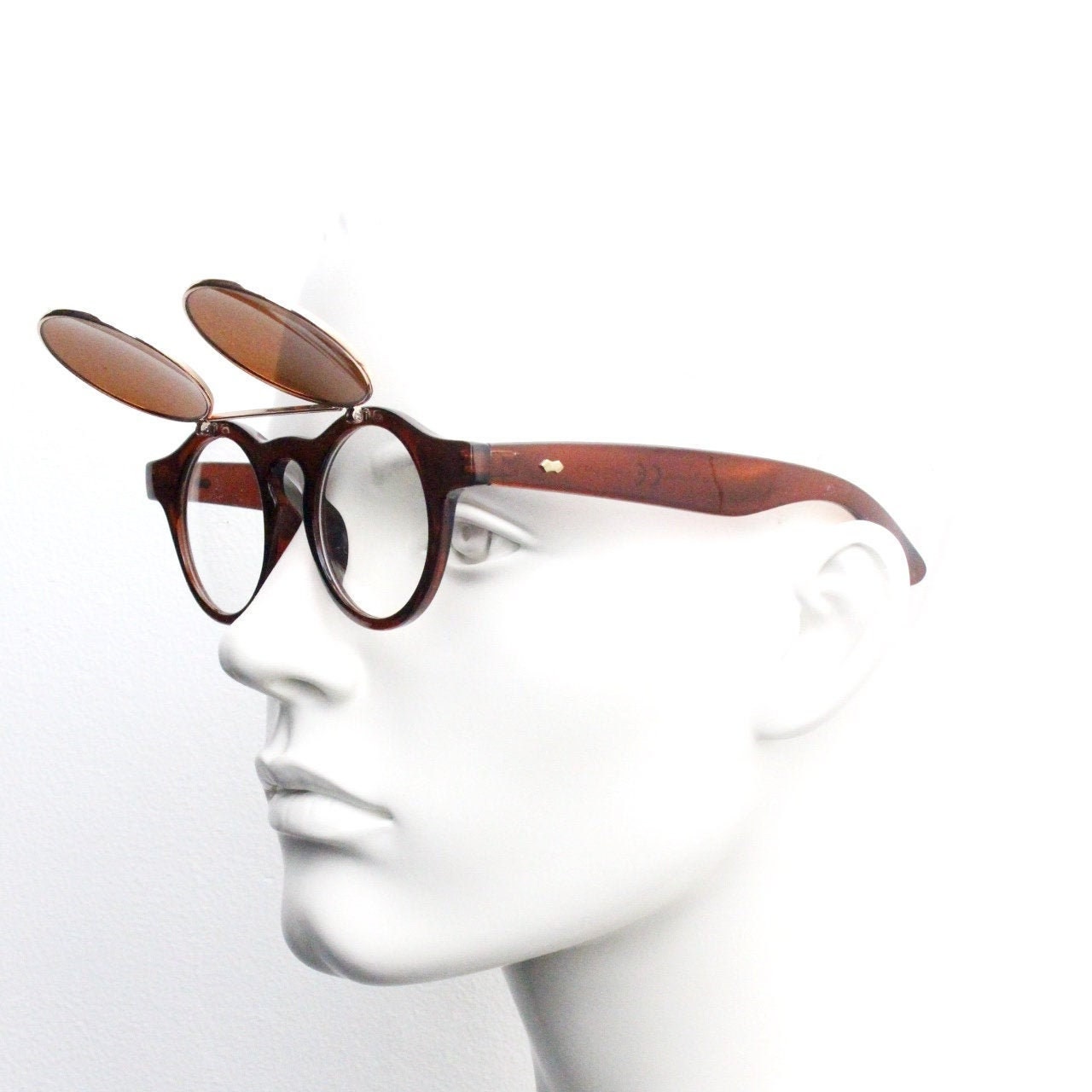 Vintage 90s round flipper sunglasses. 30s style brown frame with clear lenses and flip up sunglasses visor. BNWT unused