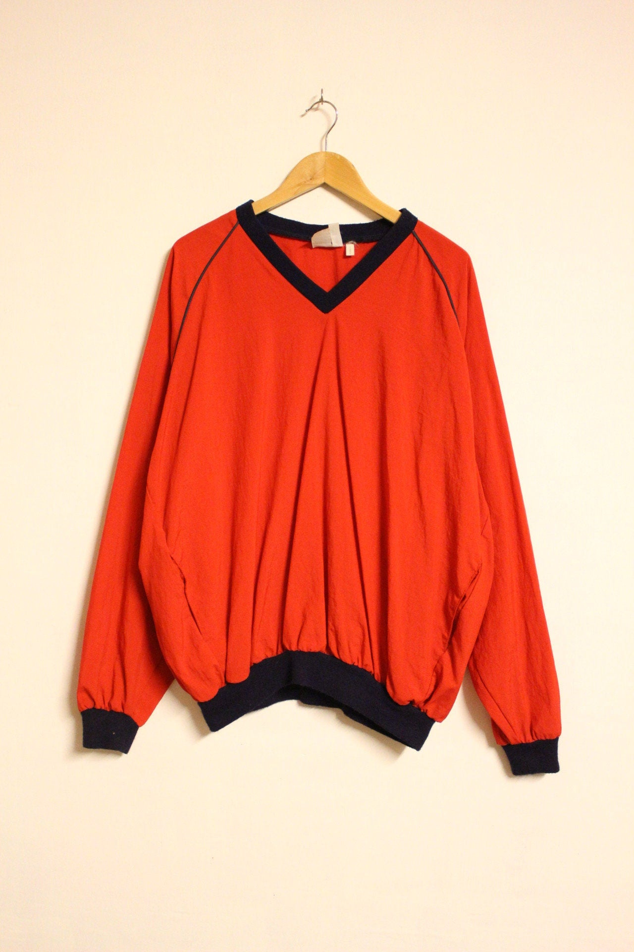 Vintage 80s oversized v neck pullover. Made in England. Bright red baggy football style unisex top. Club kids jumper. Rave