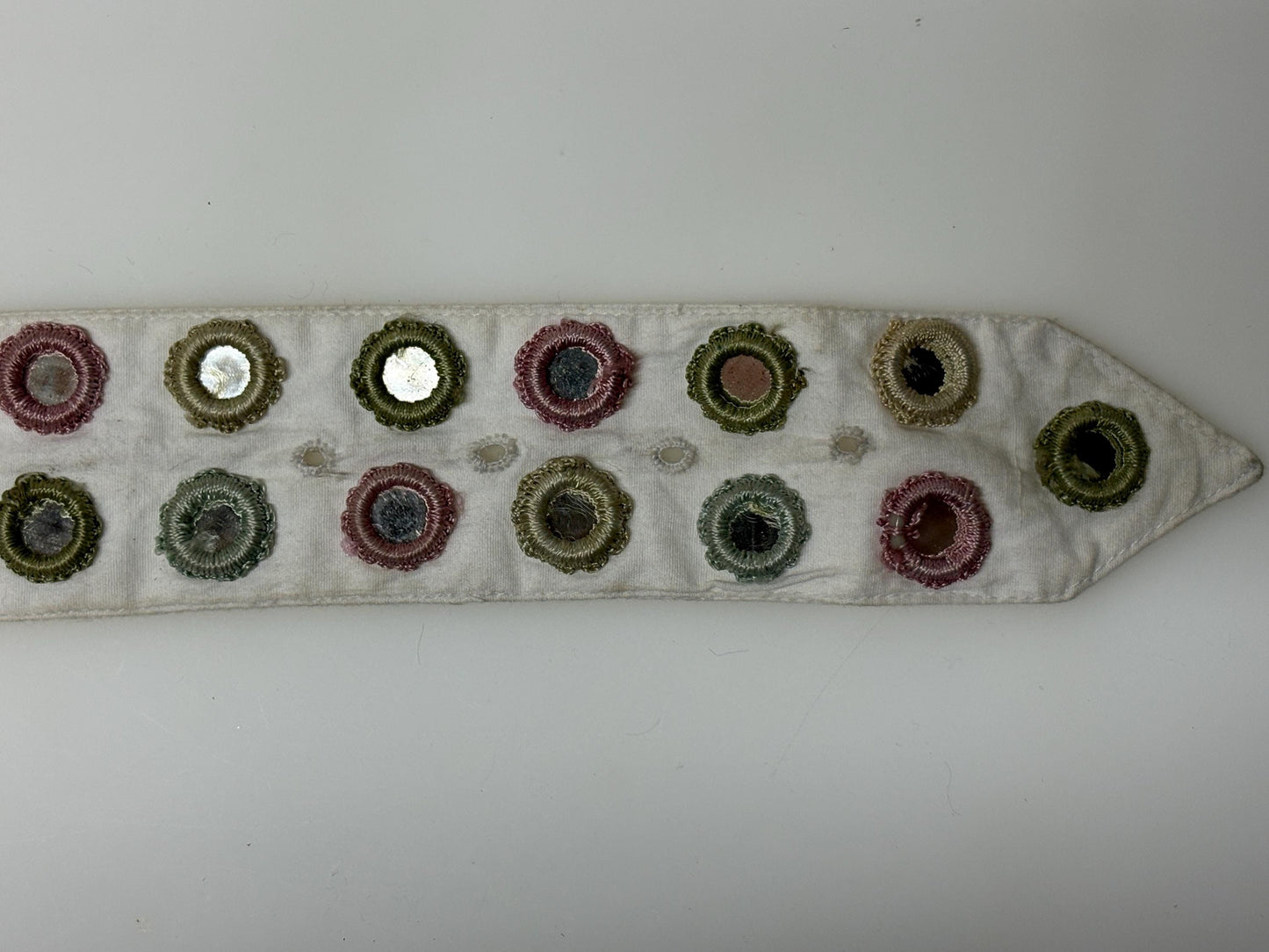 Y2K vintage womens dress belt by Stephanie Hirsch. White with pink and green embroidered little frames around mirror circles. 2000s. BNWT